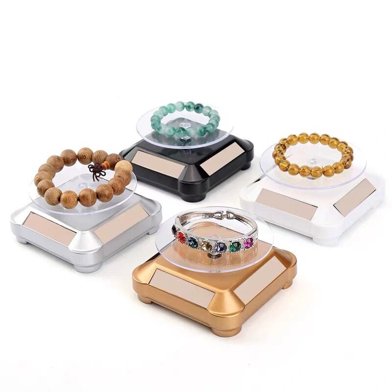 360 度ターンテーブルソーラー回転ディスプレイスタンドジュ - Jewelry And Watches Exhibition のレビューと価格